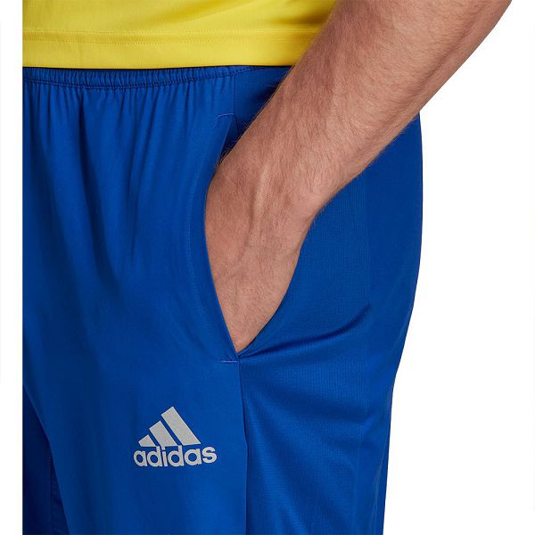 Blue Men's Adidas Own The Run Astroind Joggers Pants | 3610957-AE